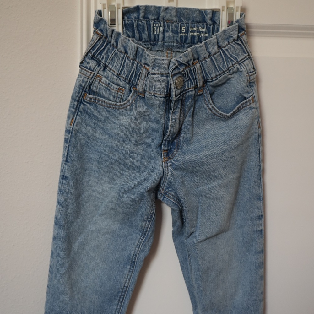Gap Girls high wasted jeans with distressed bottoms